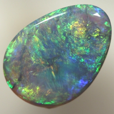 SOLID BLACK OPAL Bright orange and green over blue, always showing colour